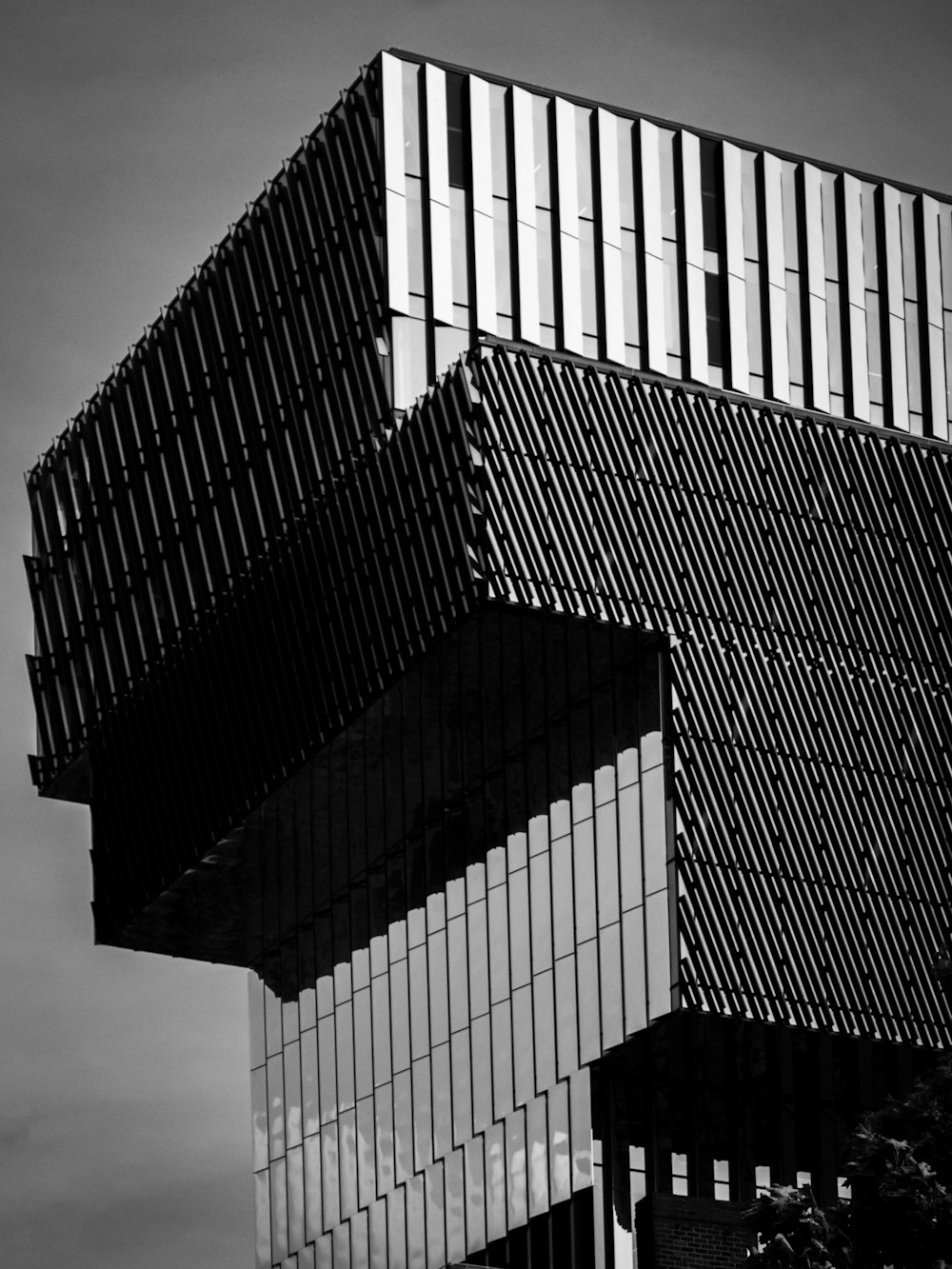 a black and white photo of a tall building