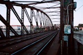 a view of a train track from a bridge