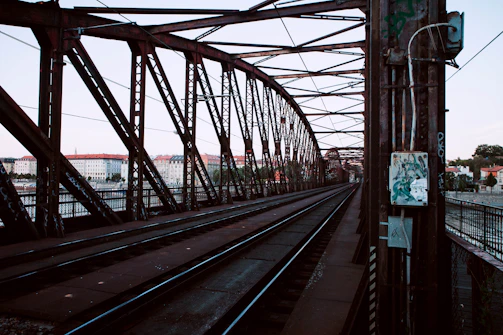 a view of a train track from a bridge