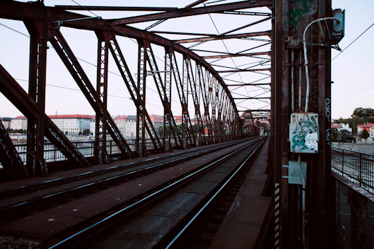 a view of a train track from a bridge