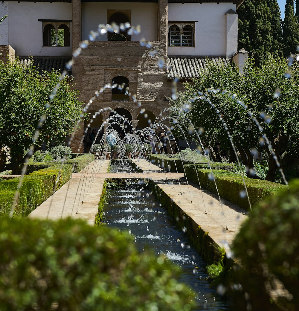 a building with a fountain in front of it