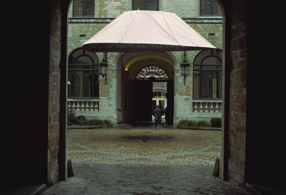 an open doorway leading to a large building