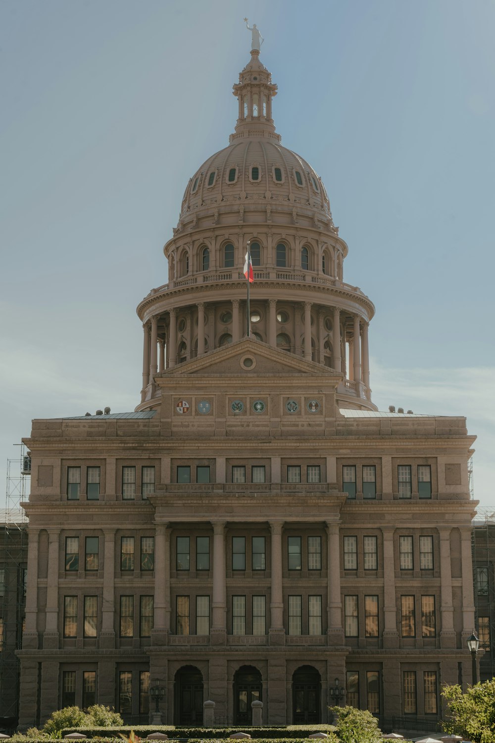 a large building with a flag on top of it