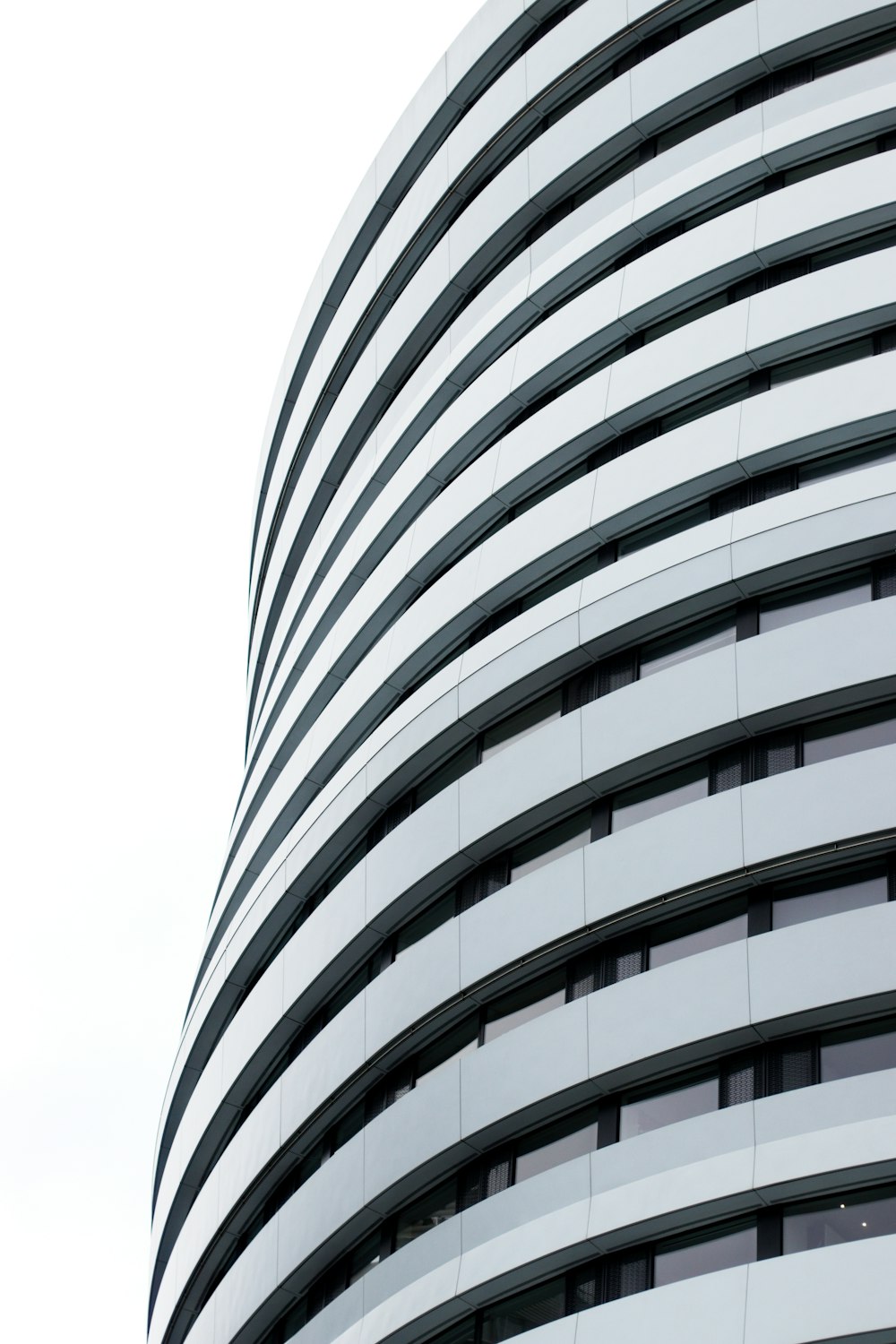 a very tall building with a clock on it's side