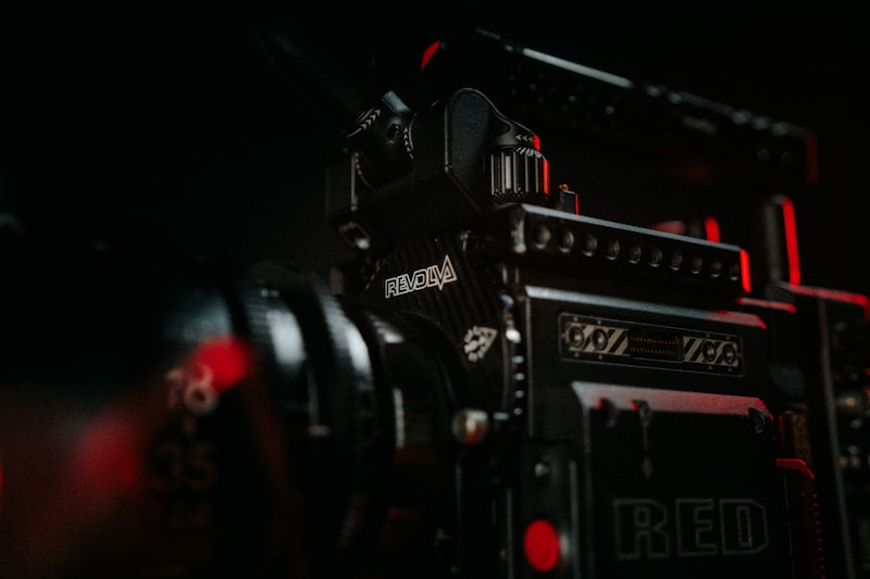 Close-up of a camera in the dark with dramatic lighting