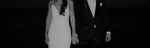 a man and a woman standing next to each other