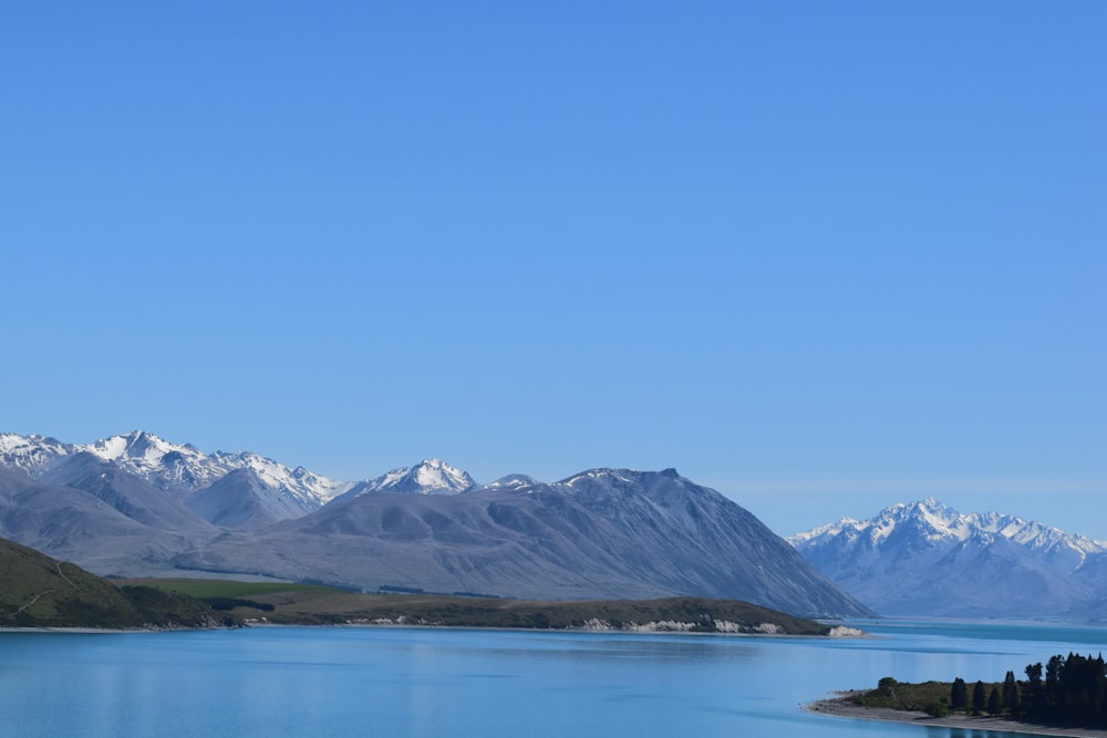 a large body of water surrounded by mountains