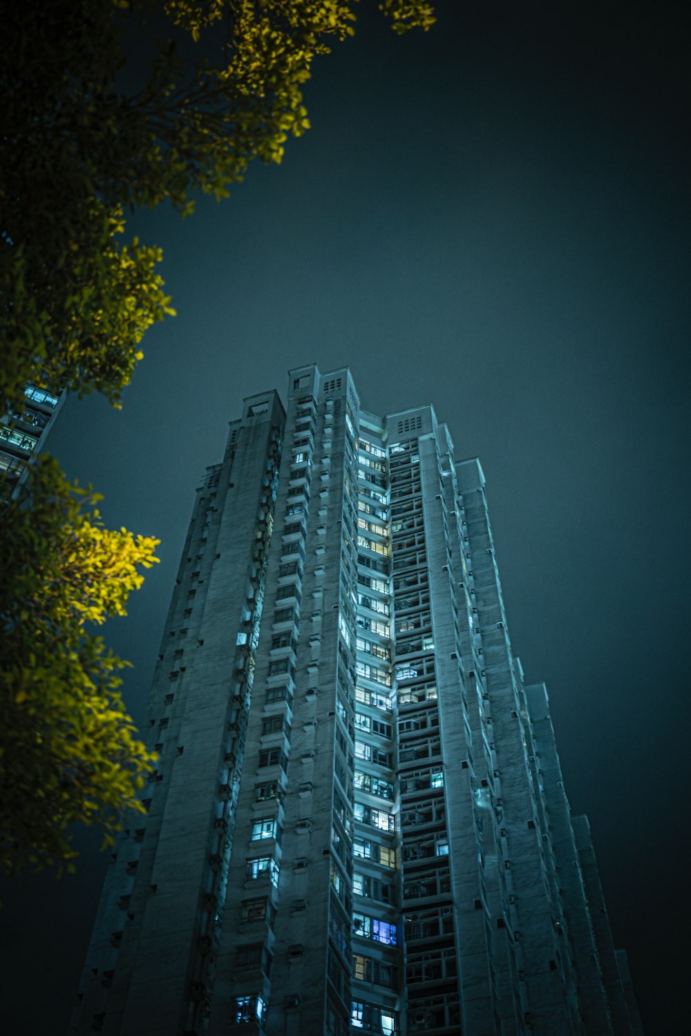 a very tall building lit up at night