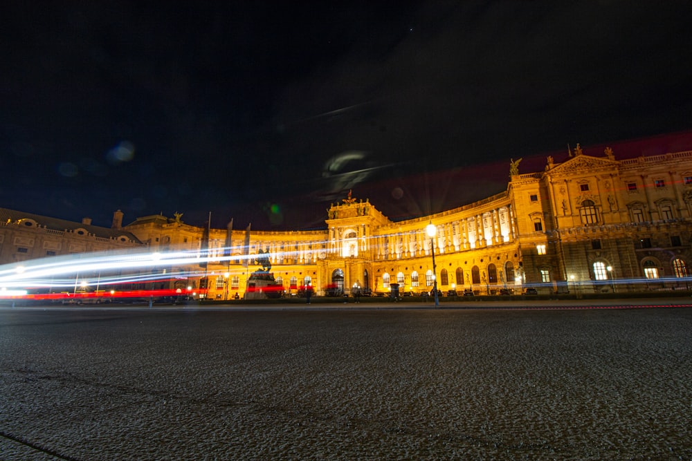 a long exposure photo of a building at night