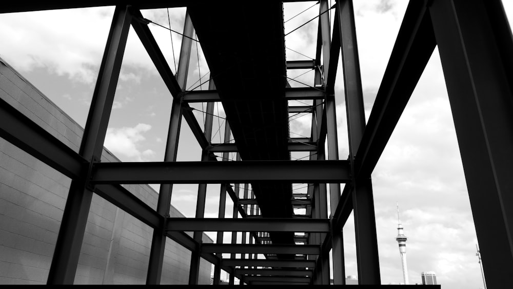 a black and white photo of a metal structure