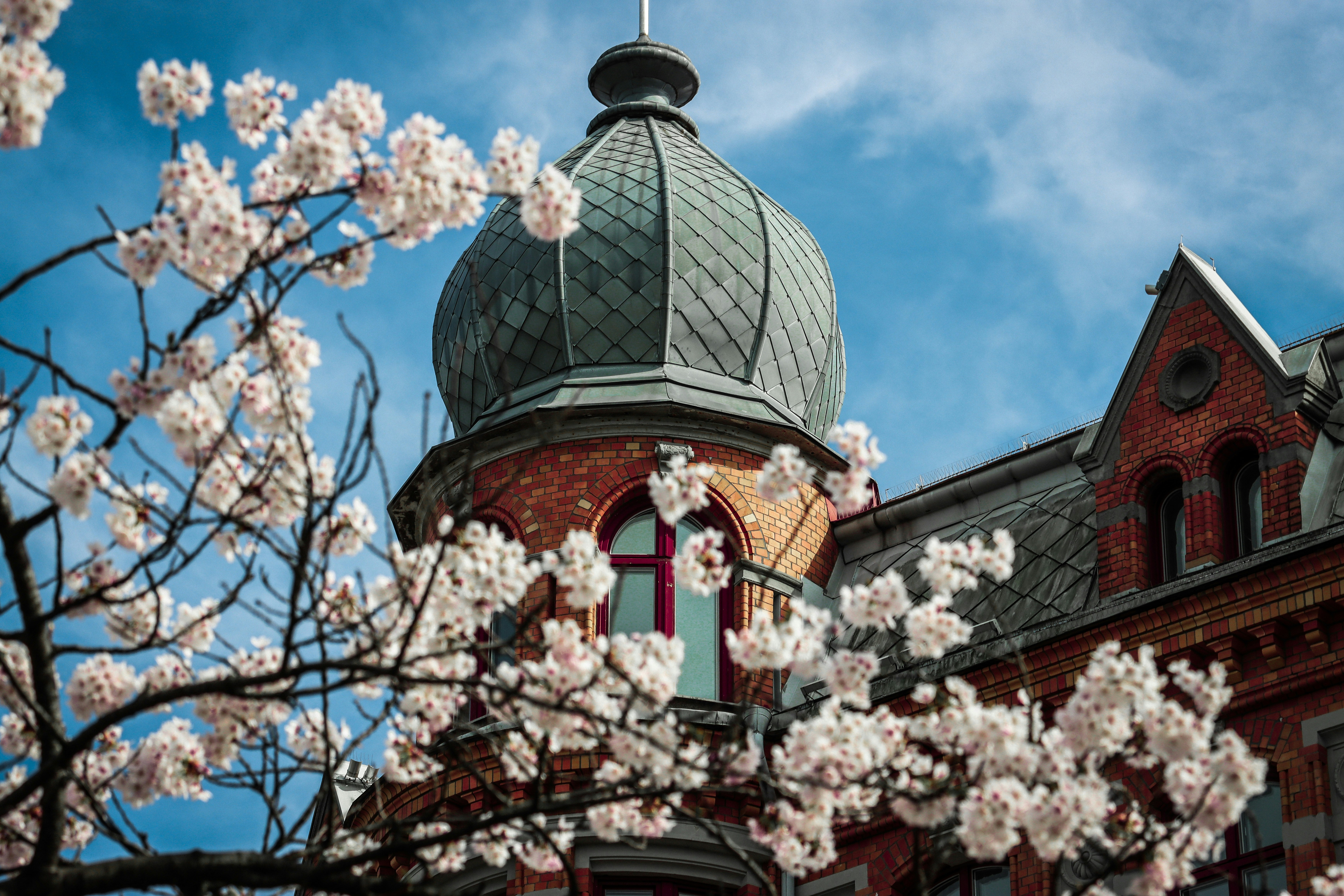 a building with a dome and a clock on it