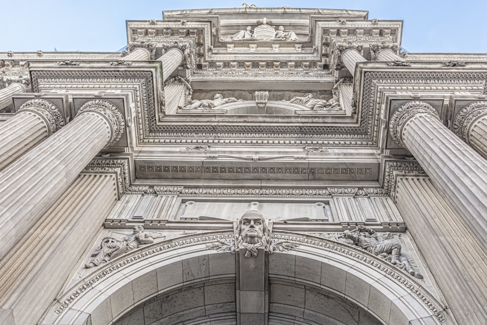 a very tall building with many pillars and arches