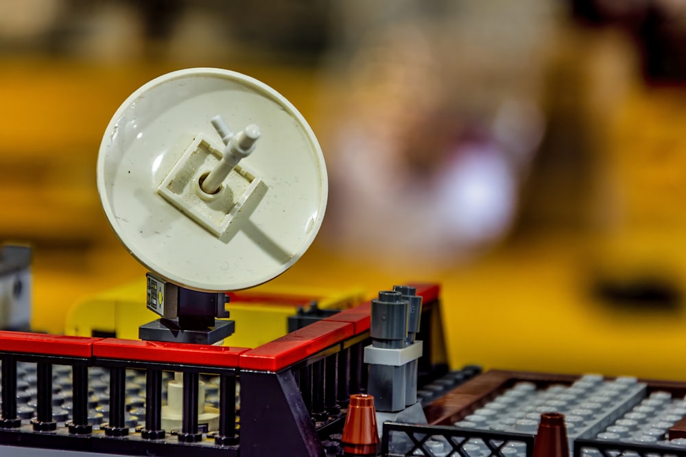 a close up of a model of a satellite dish