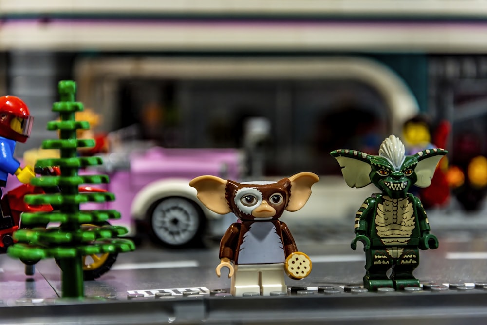 a group of toy figurines sitting on top of a table