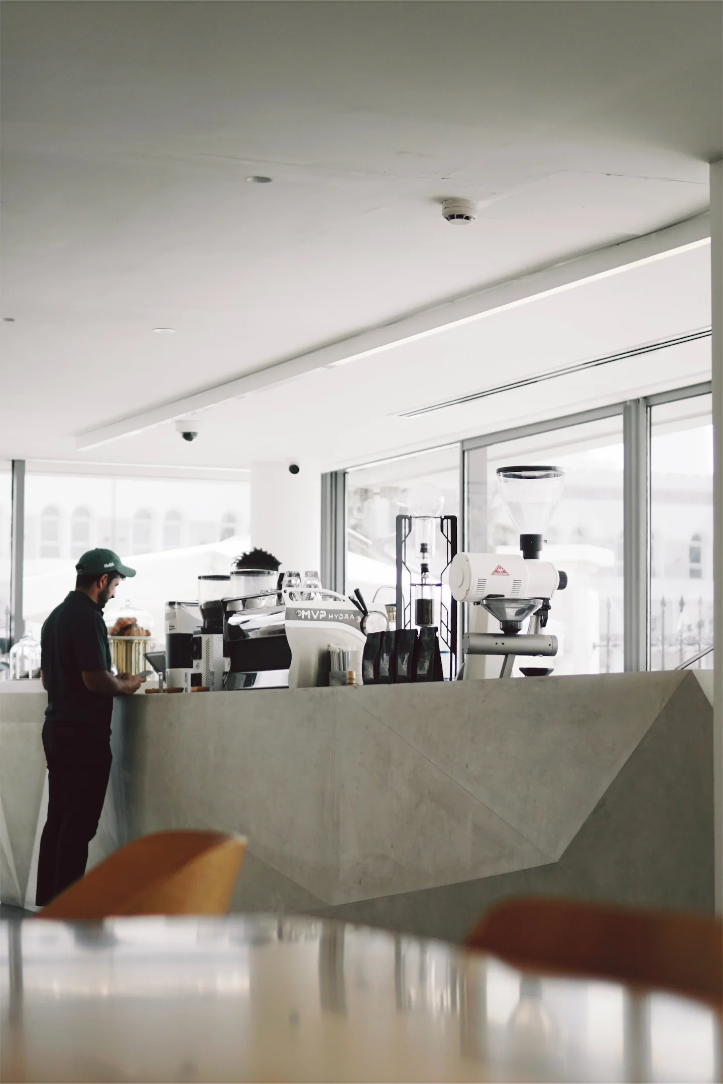 Barista at a coffee shop counter