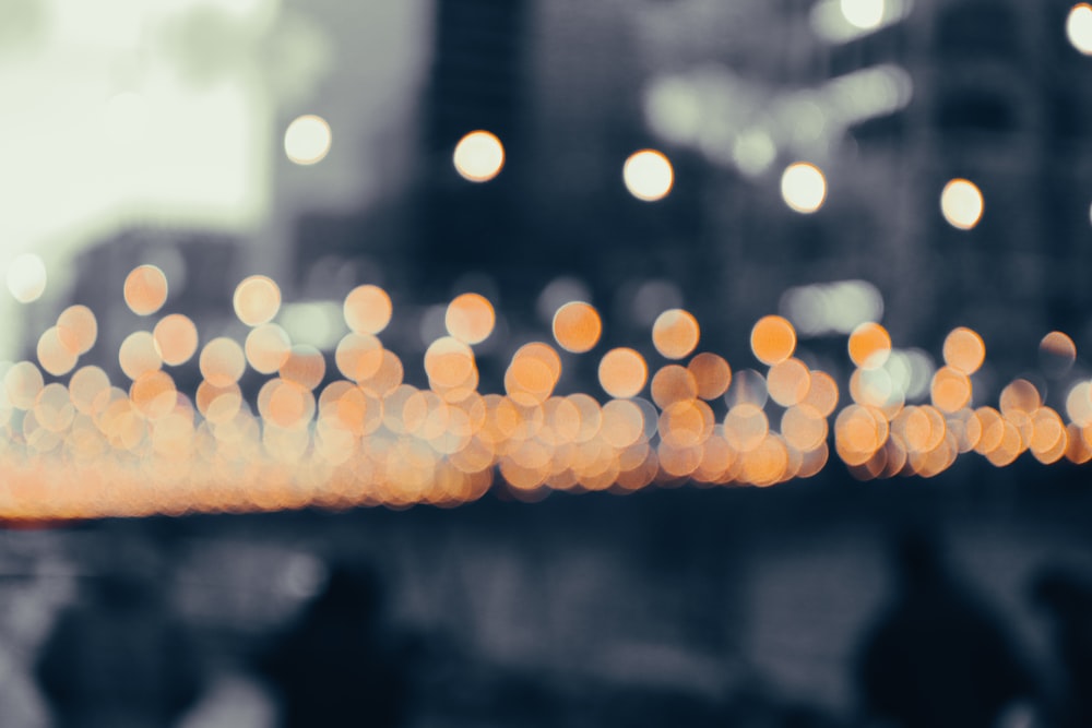 a blurry photo of a city street at night