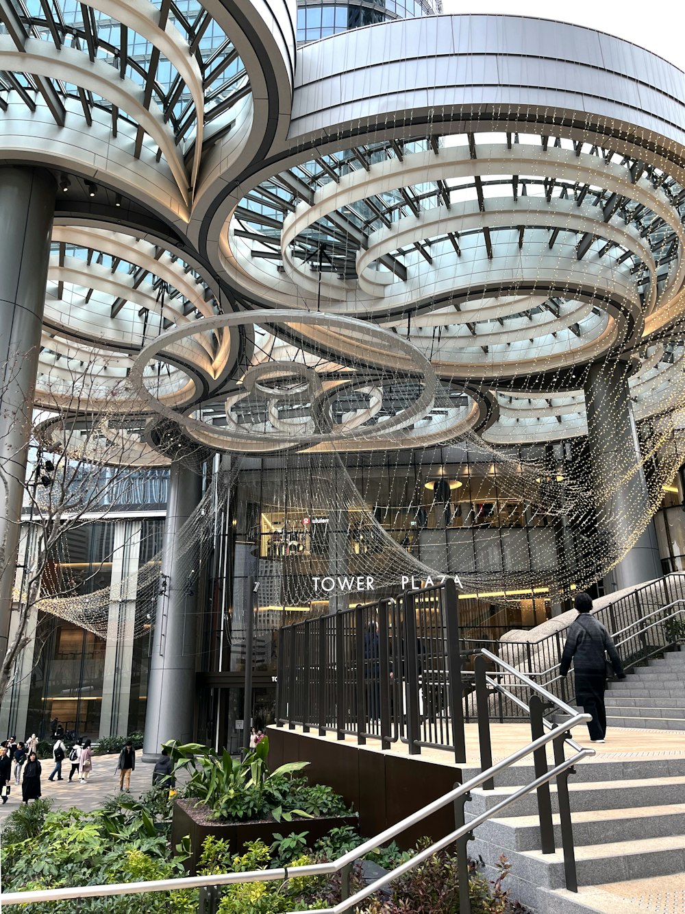 a group of people walking down a set of stairs