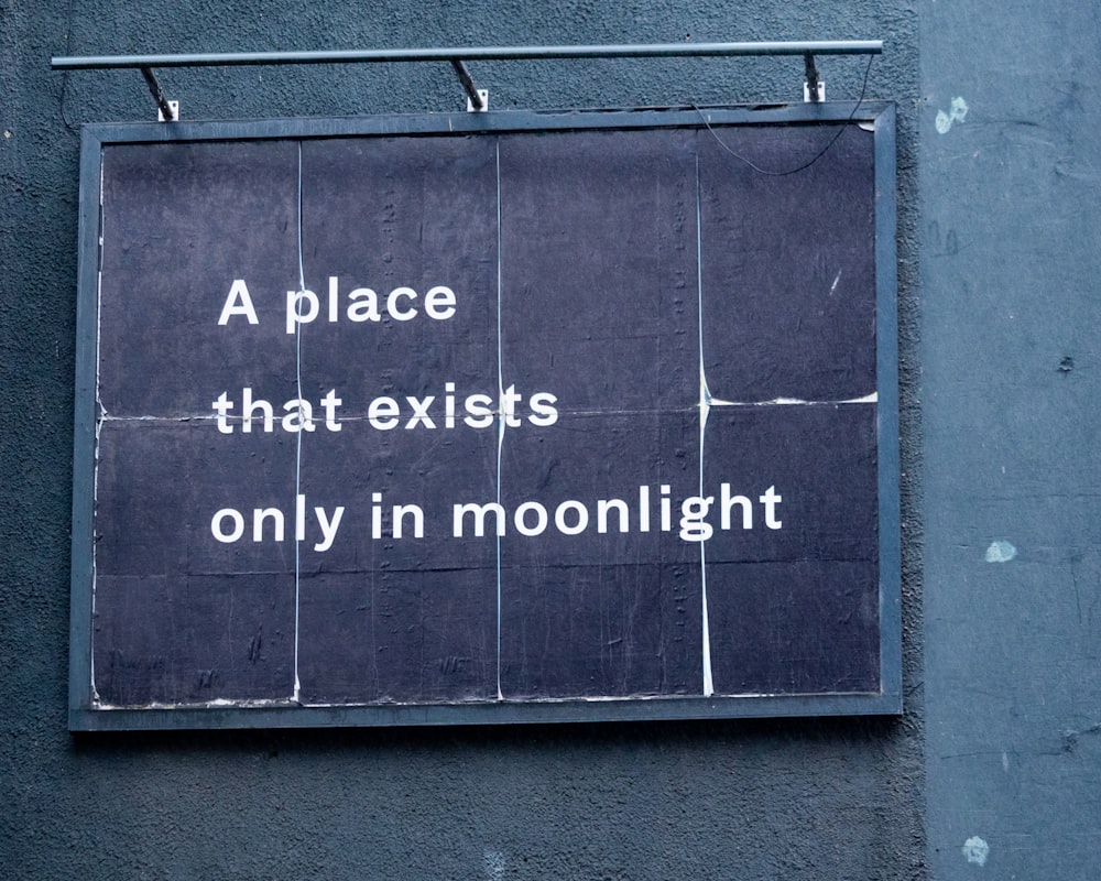 a sign on the side of a building that says a place that exits only in