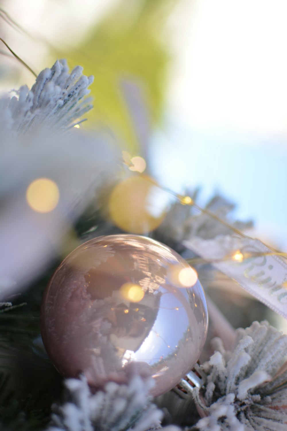 a close up of a christmas ornament on a tree