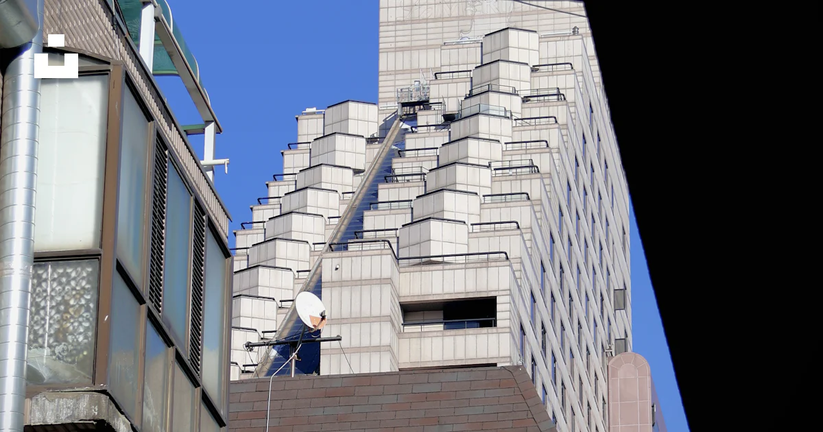 A view of a building from a distance photo – Free Building Image on ...