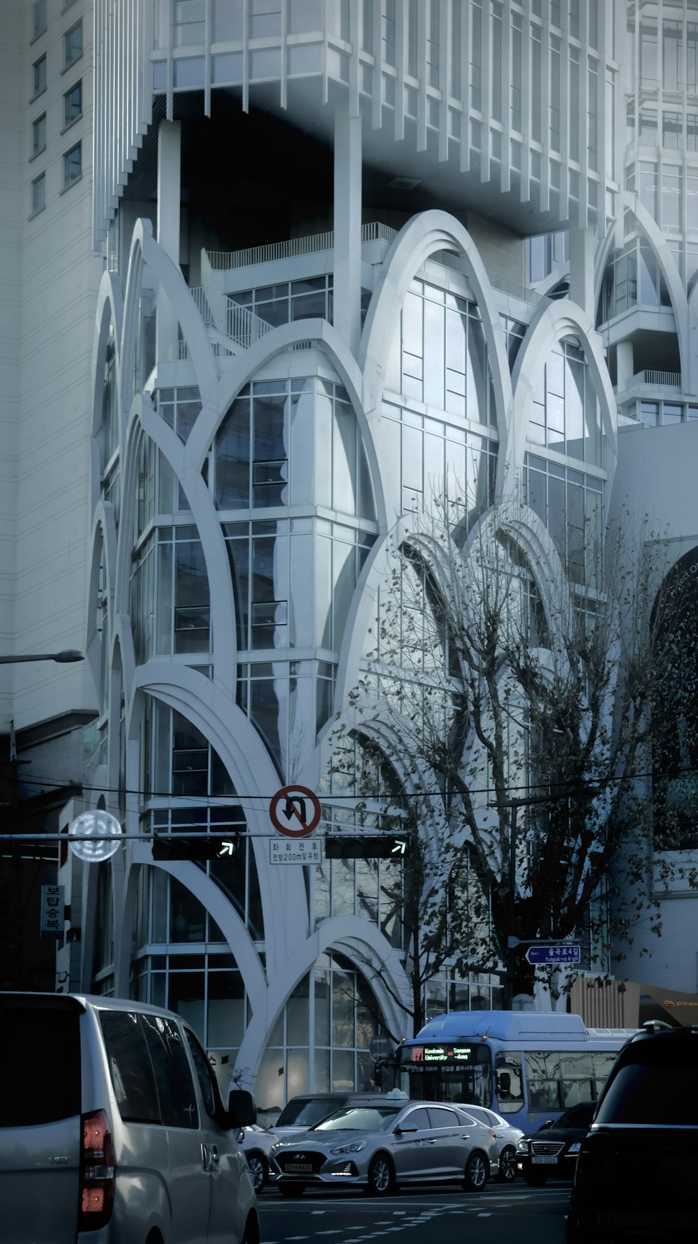 a large white building on a city street