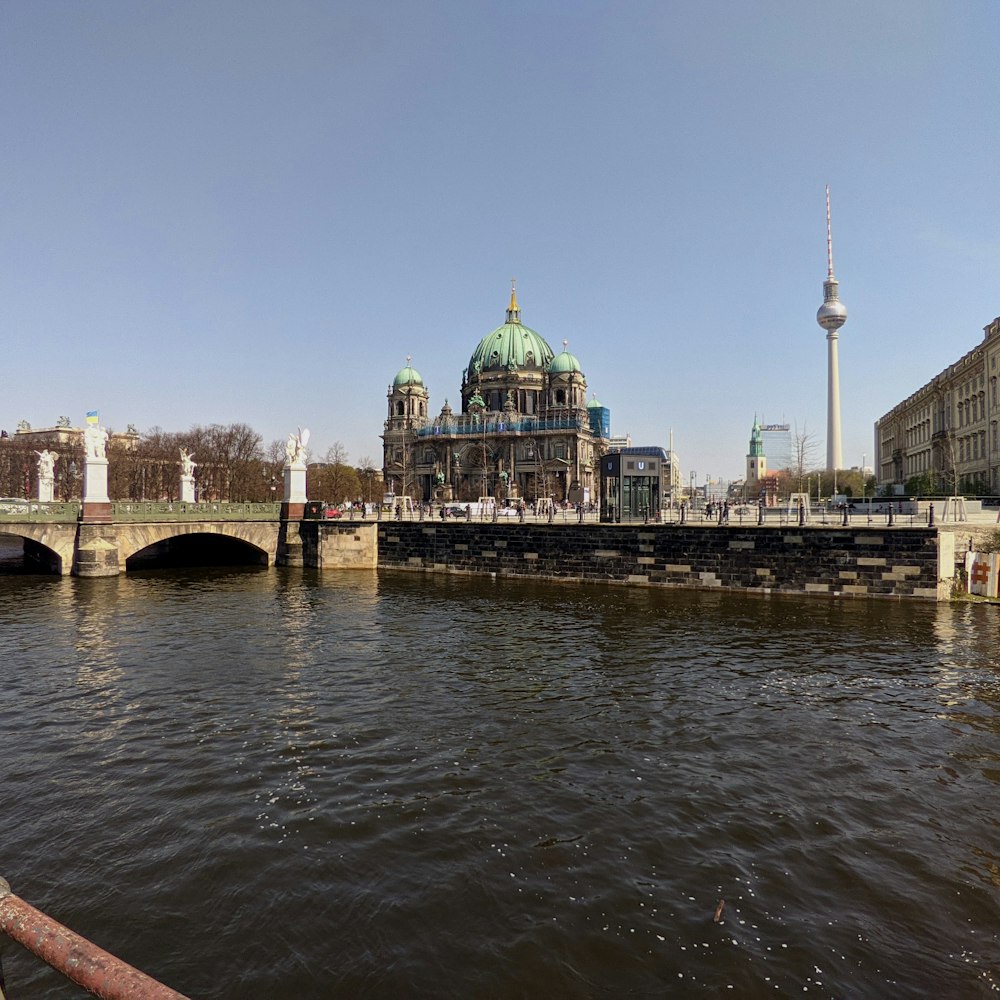 a large body of water next to a bridge