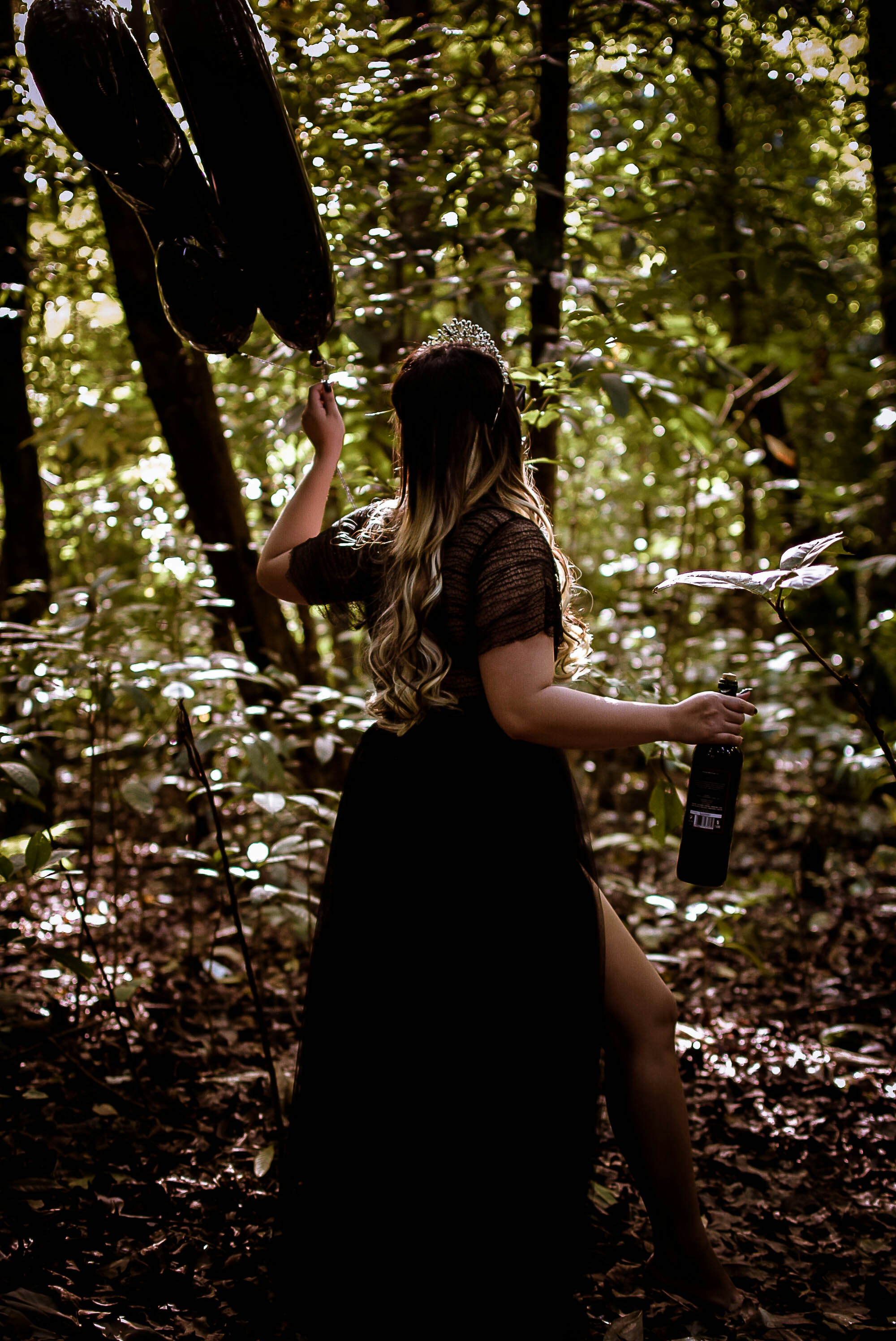A woman in a black dress in the woods photo – Free Forest Image on Unsplash