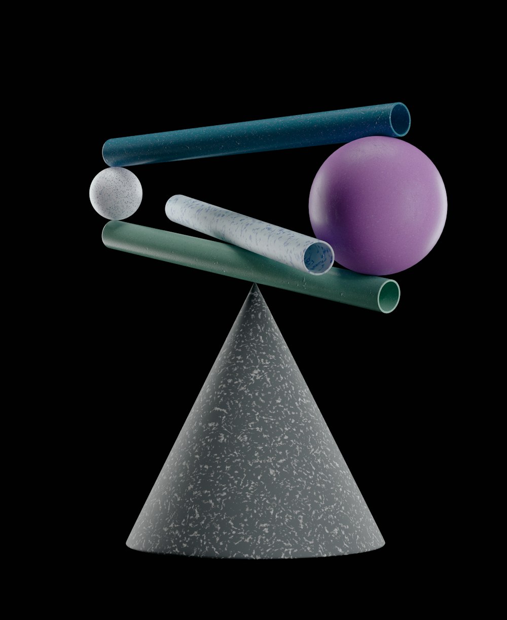a group of different colored objects sitting on top of a cone