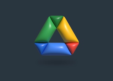 a colorful object is shown on a dark background