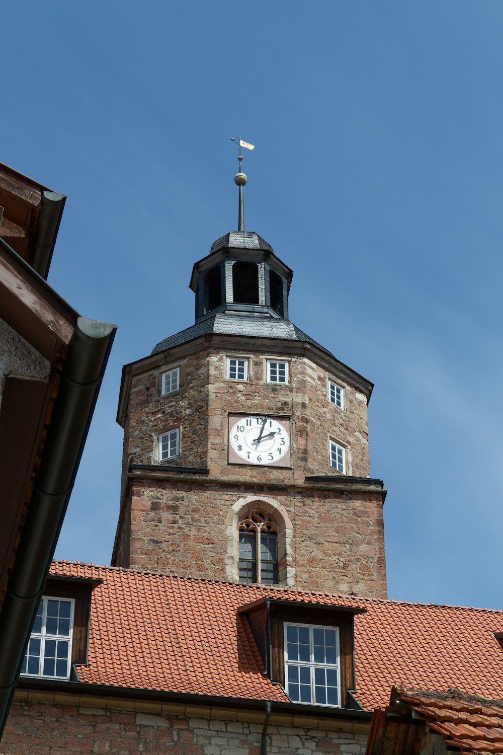 a clock tower on top of a brick building