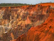 a very large cliff with a very steep cliff face
