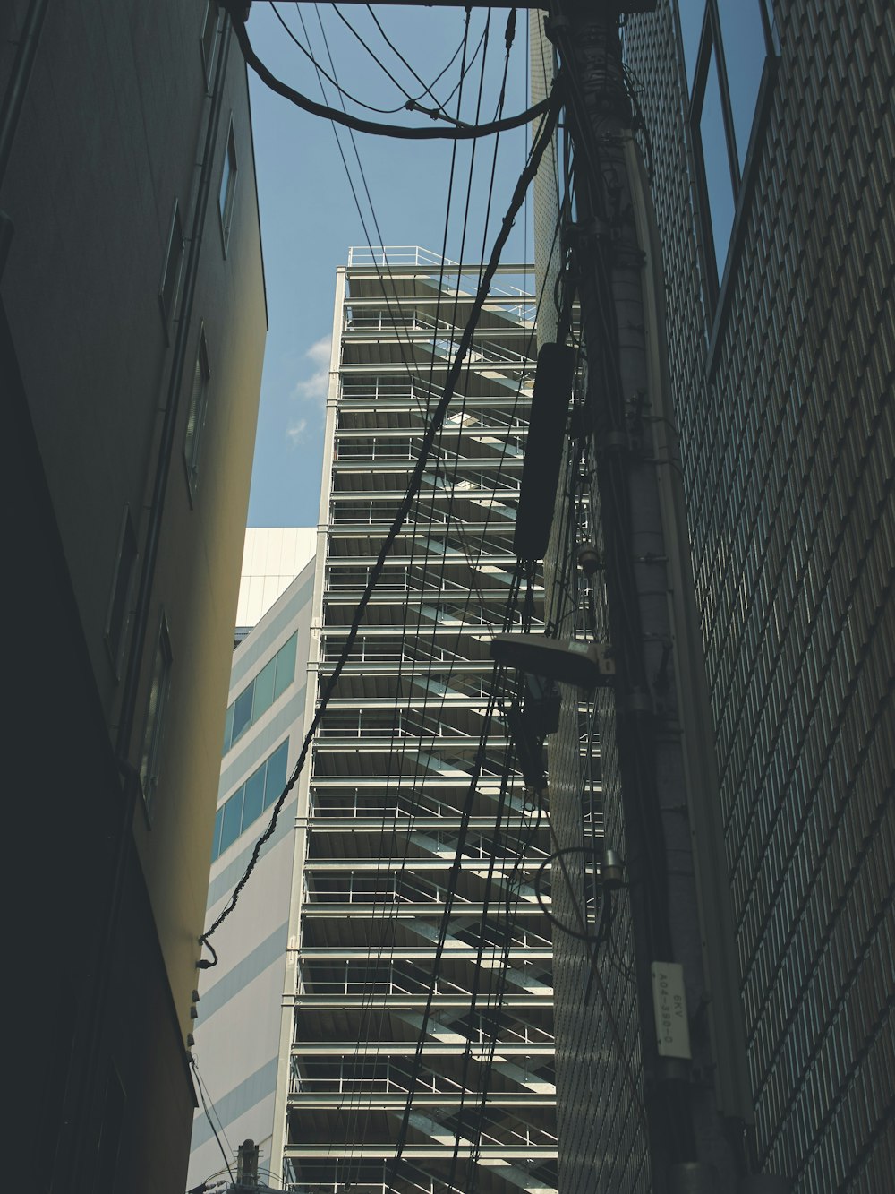 a view of a tall building from the street