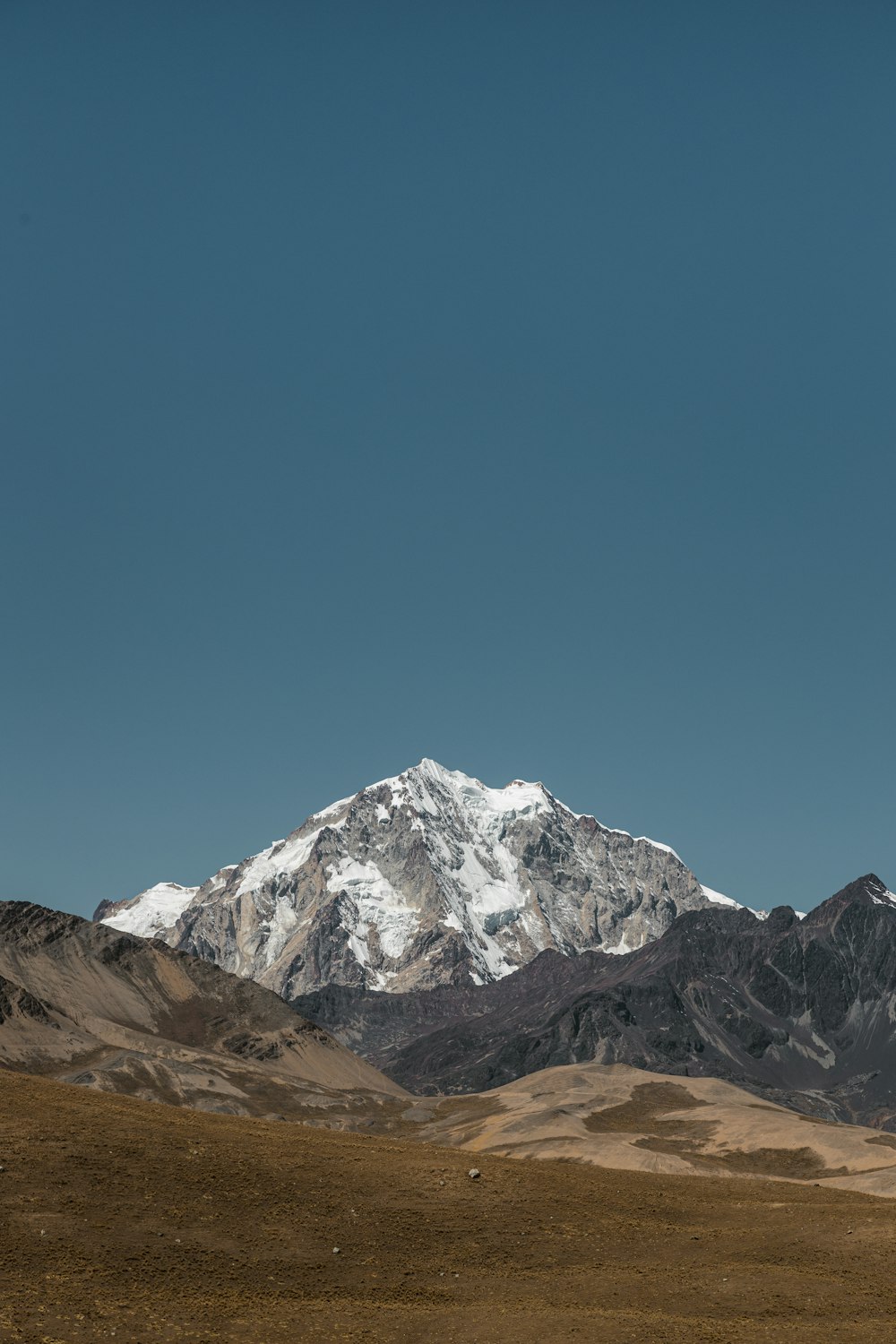 a mountain range with snow on the top