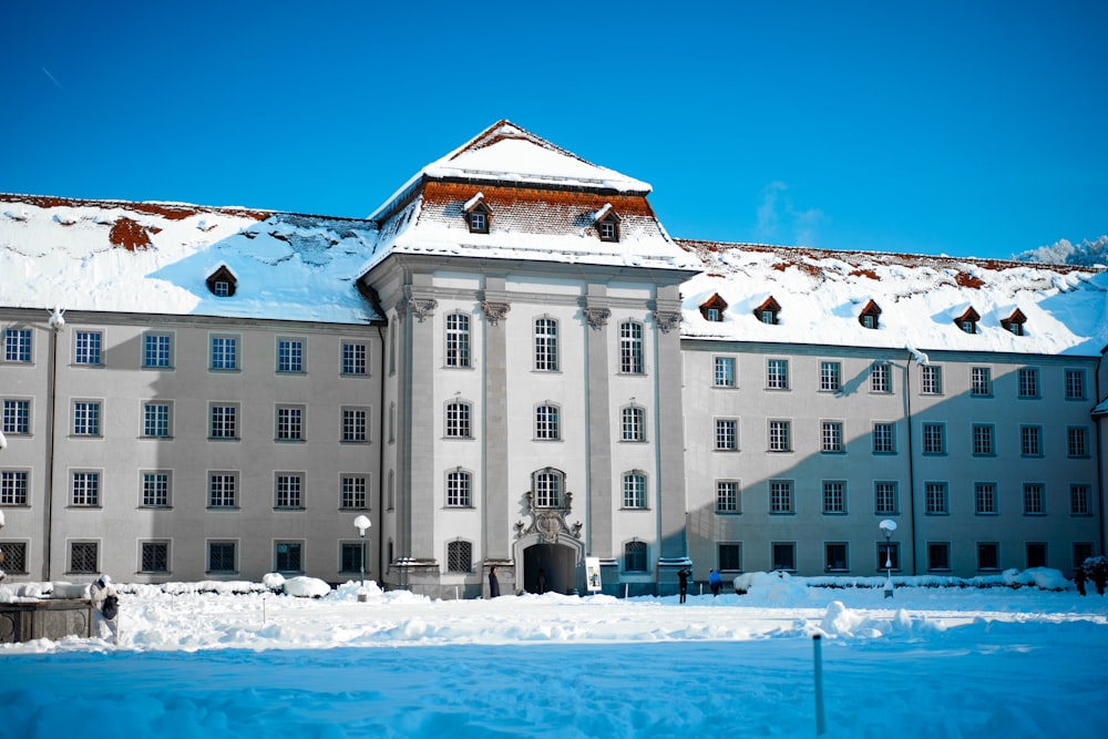 a large building with a lot of snow on top of it