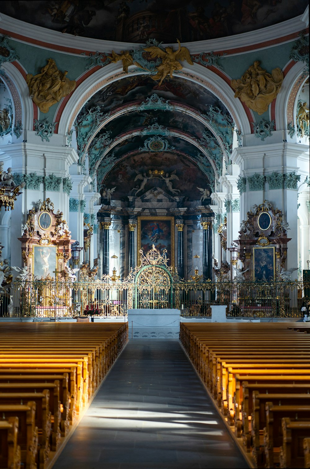 a church filled with lots of wooden pews