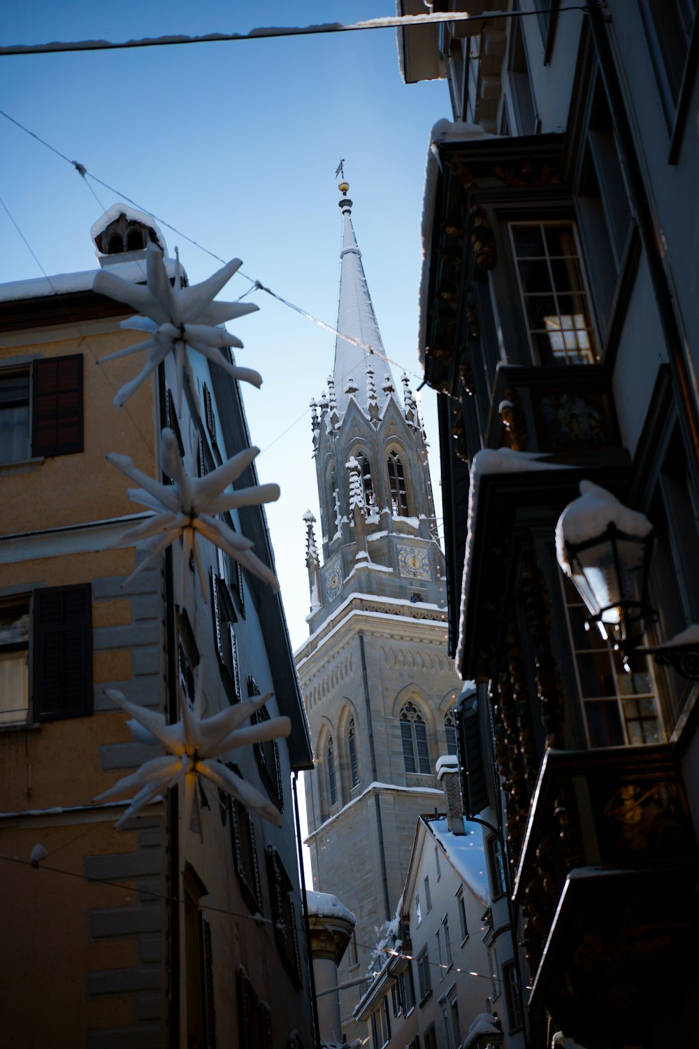 a tall building with a steeple in the background