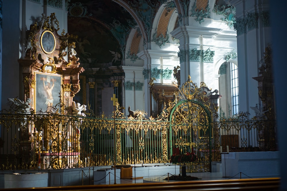 a church with a gold and green alter