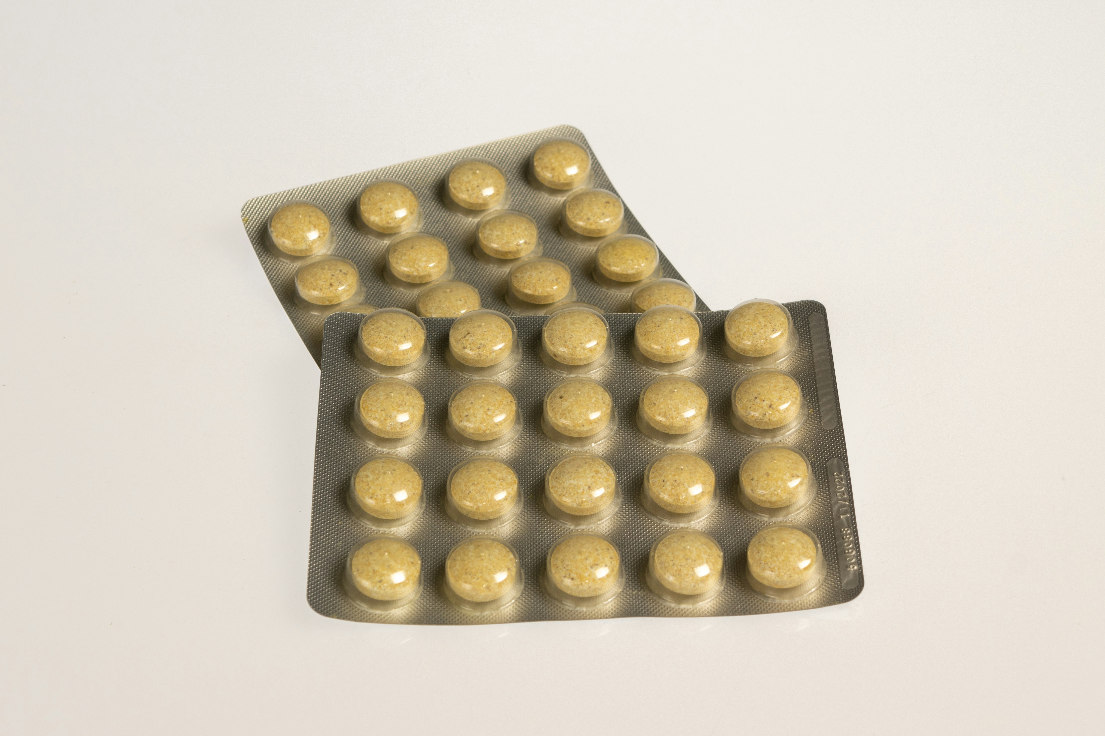 Close up blister pack on white background, healthcare concept, vitamins and minerals