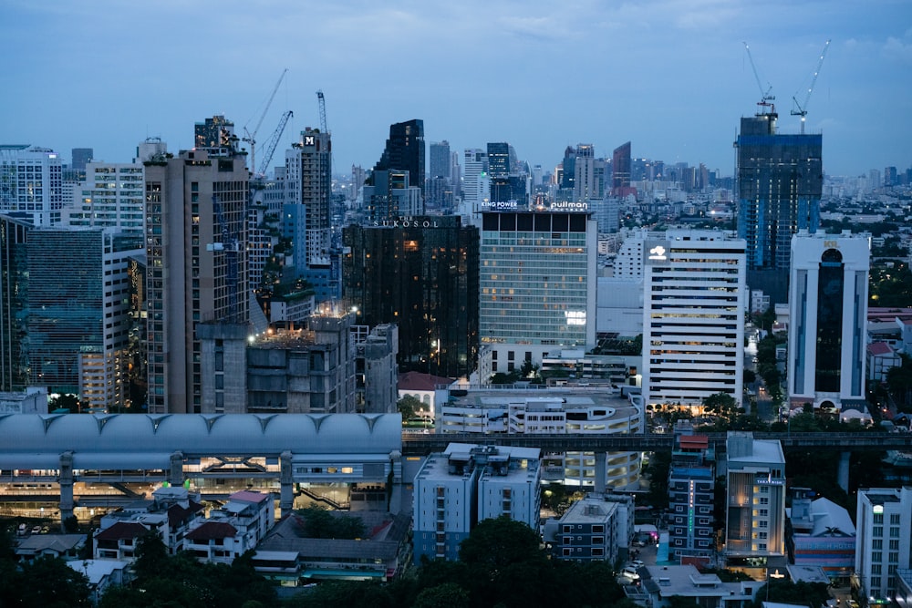 a view of a city at night from the top of a building