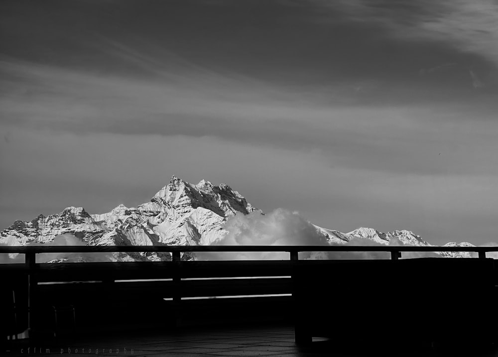 a black and white photo of a mountain range