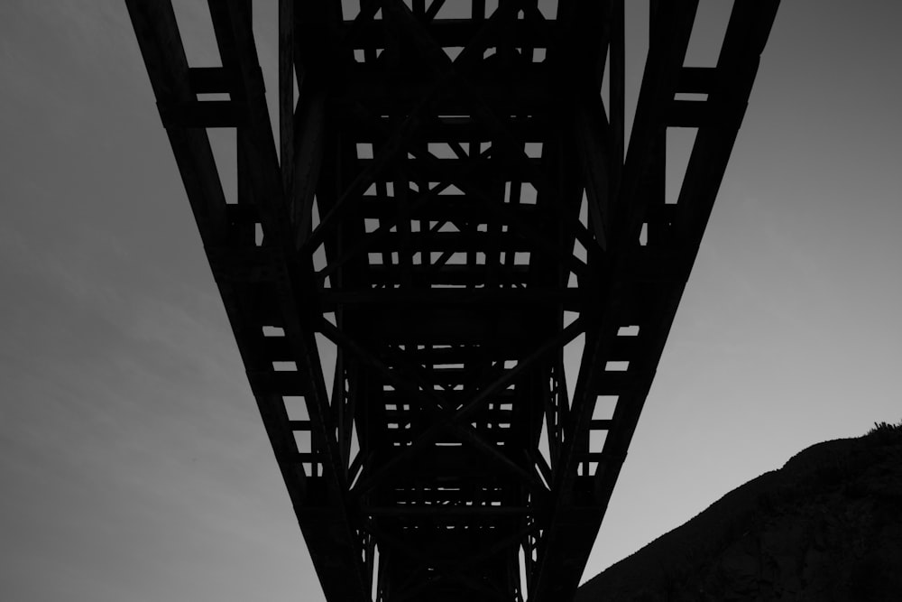 a black and white photo of a bridge