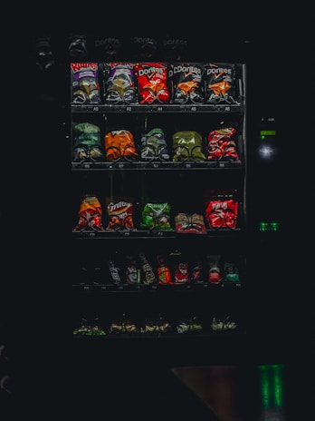 a vending machine filled with assorted snacks