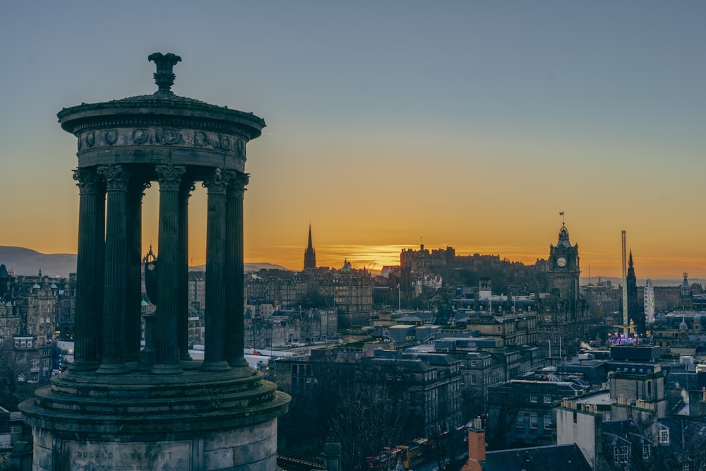 a view of a city at sunset from a tower