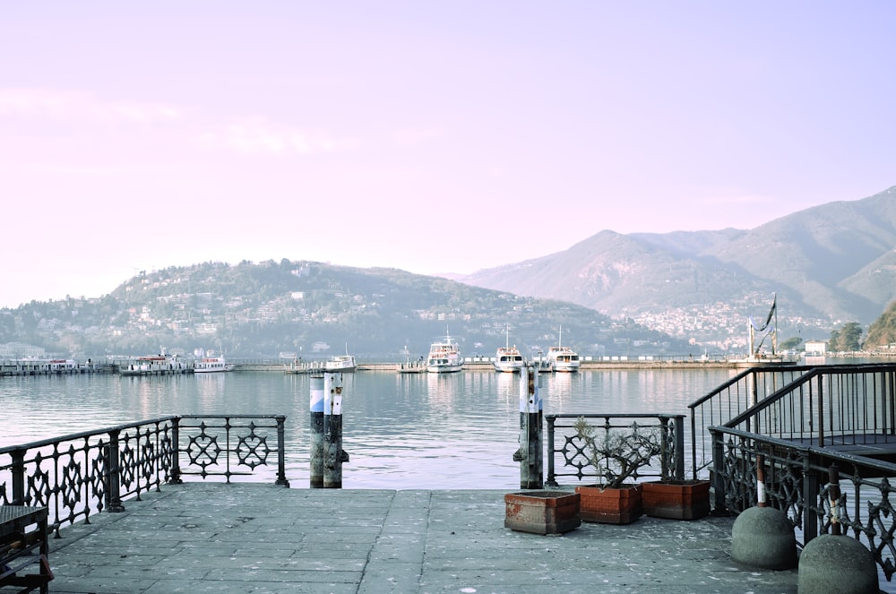 a view of a body of water with mountains in the background