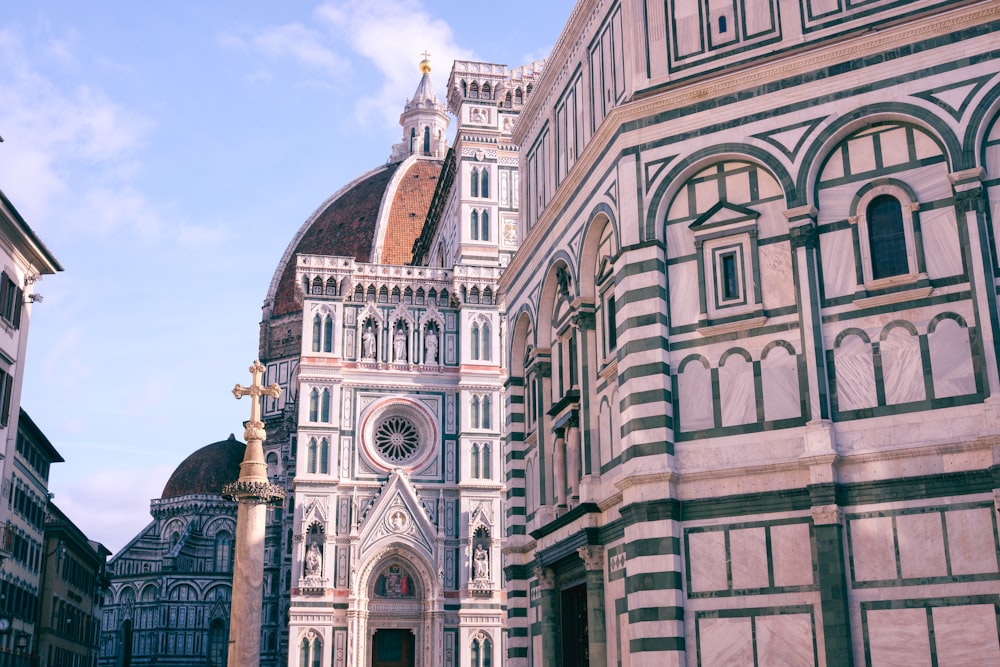 a large cathedral with a clock on the side of it