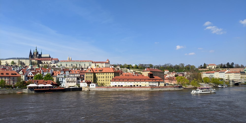 a river that has some buildings on it