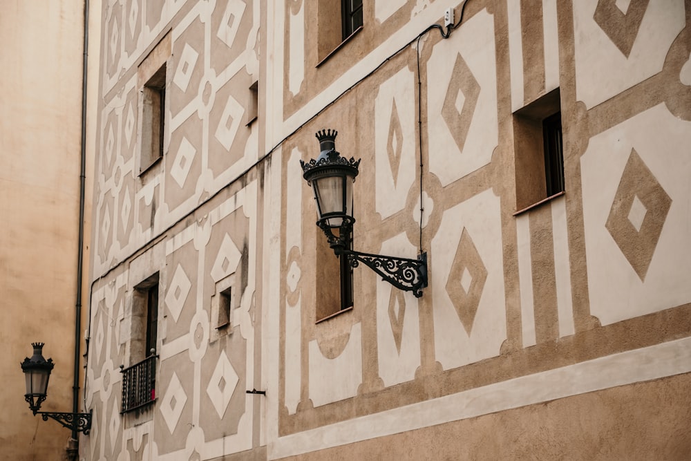 a street light on the side of a building