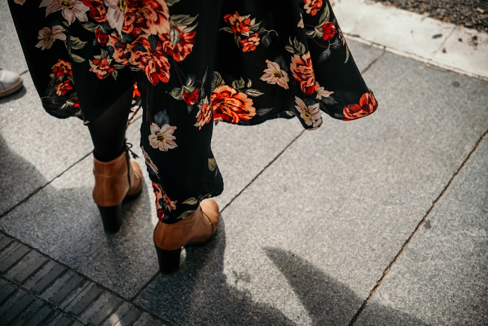 a close up of a person wearing high heels