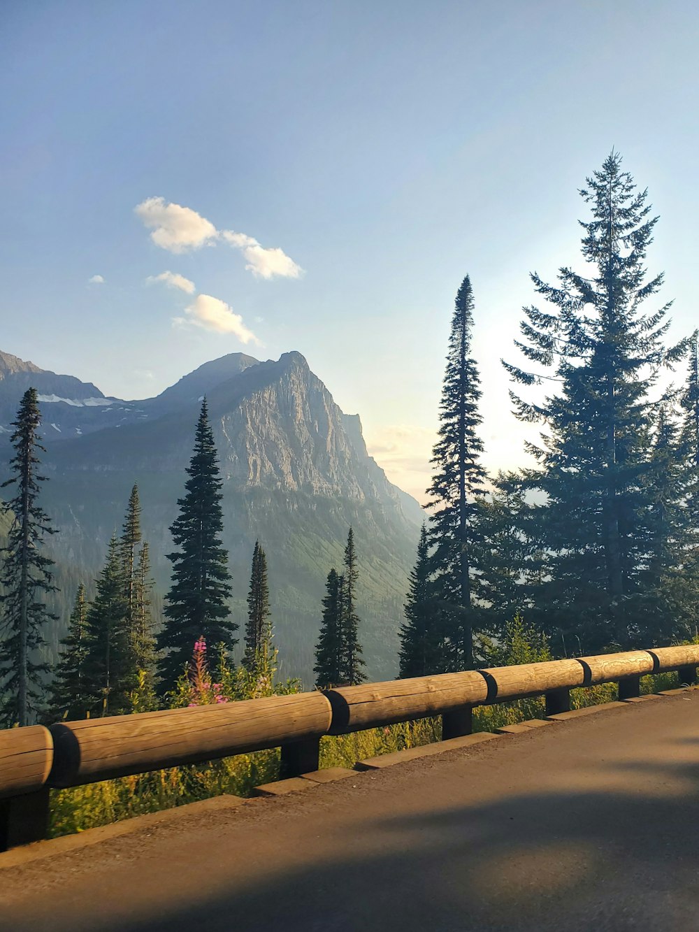 a view of a mountain range from a highway