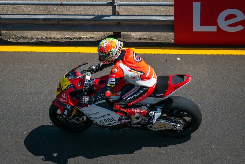 a person riding a motorcycle on a race track